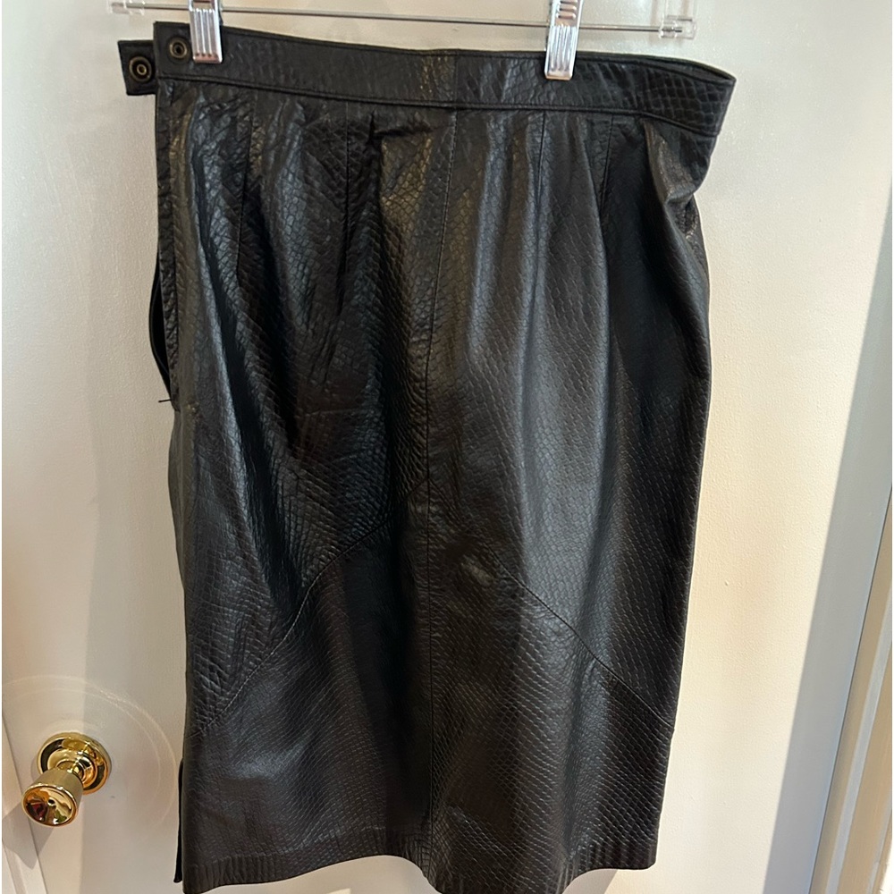 Wilson’s genuine snakeskin black leather skirt.